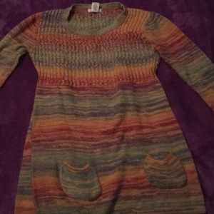 A colorful sweater with pockets!